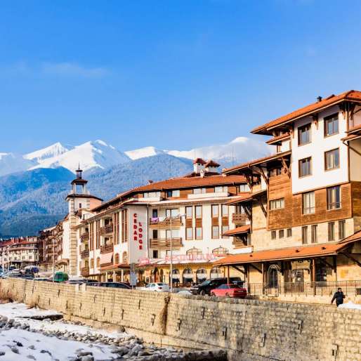 Bansko, Bulgaria-February 12 .2019. Old streets of Bansko in Bulgaria.Nice Sunny weather. Holidays people relax in the ski resort in the winter